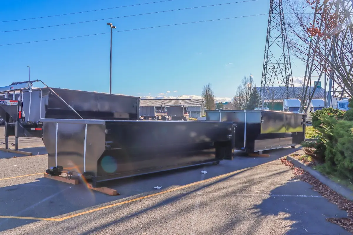 Roll-off dumpster ready for waste disposal at job site for Concrete Dumpster Rental in Hibbing